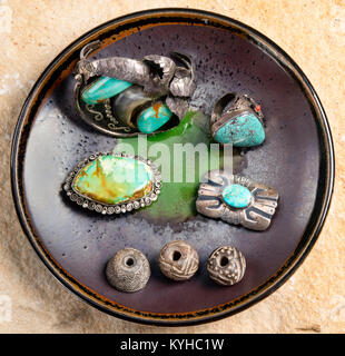Antique Navajo silver and turquoise jewelry with pre columbian indian whirls. Stock Photo
