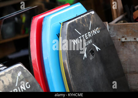 A group of Wittering Surf products pictured outside the Wittering Surf Shop in East Wittering, West Sussex, UK. Stock Photo