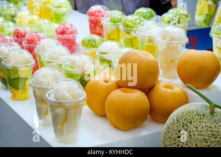 Fresh fruit Salad in plastic cups (Korean Street food) Stock Photo