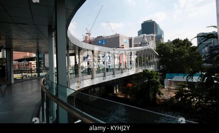 BTS Skytrain Plaza Structures and buildings in the Siam Square area of Bangkok Thailand Central World Tower in Background Stock Photo