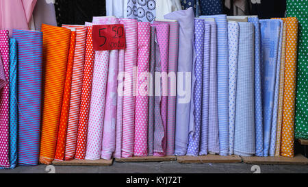 Colourful Fabric Textile Rolls in Material Shop Stock Photo