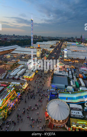 München, Munich: Oktoberfest beer festival: beer tent, rides, roller coaster, carousel, view from Ferris wheel, amusement ride rides, Oberbayern, Uppe Stock Photo