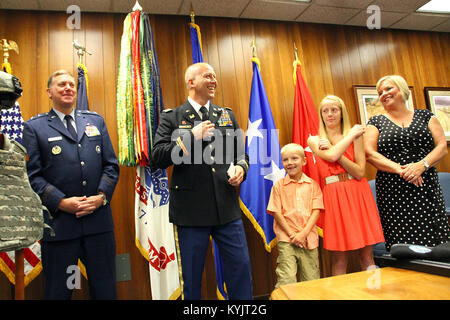 Lt. Col. Jerry Morrison, commander of the 149th Maneuver Enhancement Brigade is promoted to the rank of colonel during a ceremony in Frankfort, Ky., July 9, 2014. (U.S. Army National Guard photo by Staff Sgt. Scott Raymond) Stock Photo