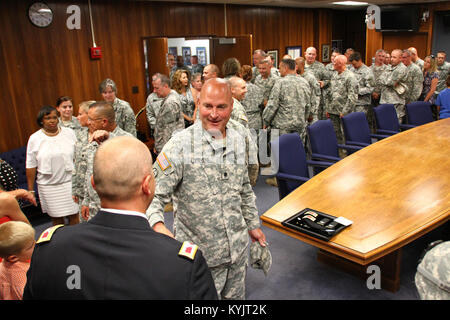 Lt. Col. Jerry Morrison, commander of the 149th Maneuver Enhancement Brigade is promoted to the rank of colonel during a ceremony in Frankfort, Ky., July 9, 2014. (U.S. Army National Guard photo by Staff Sgt. Scott Raymond) Stock Photo