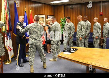 Lt. Col. Jerry Morrison, commander of the 149th Maneuver Enhancement Brigade is promoted to the rank of colonel during a ceremony in Frankfort, Ky., July 9, 2014. (U.S. Army National Guard photo by Staff Sgt. Scott Raymond) Stock Photo