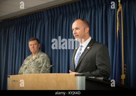 Matt Selph, director of the Kentucky Board of Elections, speaks to more than 40 members of the 123rd Airlift Wing at the Kentucky Air National Guard Base in Louisville, Ky., April 24, 2015, prior to the Airmen's deployment to an undisclosed air base in the Persian Gulf region. The troops, who left aboard a Kentucky Air Guard C-130 Hercules aircraft, comprise the third rotation of 123rd Airmen to deploy to the base since February. The Air Guardsmen will be flying airlift missions throughout the U.S. Central Command Area of Responsibility in support of Operation Freedom's Sentinel, which provide Stock Photo