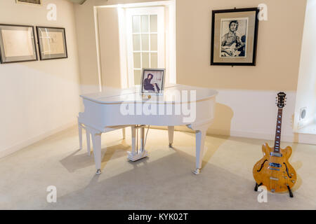 John Lennon’s piano playing the song Imagine in the Beatles Story attraction in Liverpool, UK Stock Photo