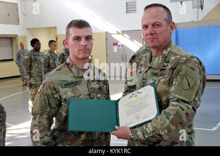 Kentucky Guard leadership welcomes the newest Soldiers into Kentucky's ranks during First Formation in Frankfort, Ky., Nov. 17, 2016. (U.S. Army National Guard photo by Staff Sgt. Scott Raymond) Stock Photo