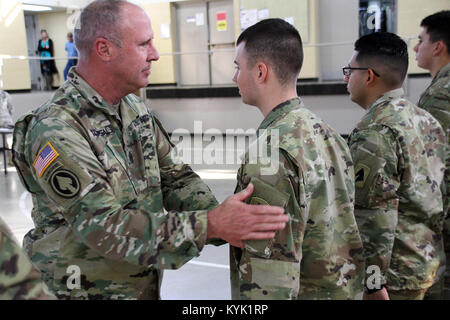 Kentucky Guard leadership welcomes the newest Soldiers into Kentucky's ranks during First Formation in Frankfort, Ky., Nov. 17, 2016. (U.S. Army National Guard photo by Staff Sgt. Scott Raymond) Stock Photo