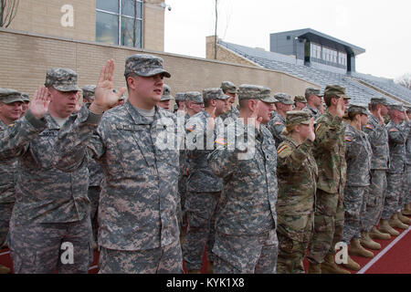 Soldiers with the 198th Military Police Battalion are sworn in and deputized as Special Police Officers with the D.C. Metro Police Department in Washington, D.C., Jan. 19, 2017. (U.S. Army National Guard photo by Staff Sgt. Scott Raymond) Stock Photo