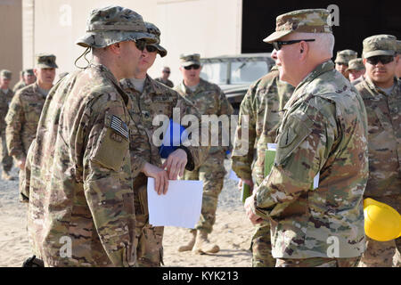 Kentucky's Director of the Joint Staff Brig. Gen. Benjamin Adams III greets Soldiers from the 207th Horizontal Construction Company Mar. 4 during a visit to Camp Arifjan, Kuwait. Stock Photo