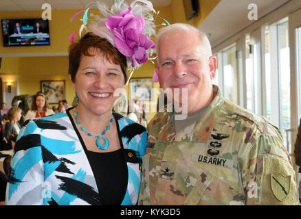 Donna Engerman, the Active duty coordinator, US Army Installation Command, poses with Brig. Gen. Benjamin F. Adams III, Chief of the Joint Staff, Land Component Commander, Kentucky National Guard, during the Survivors Outreach Services event hosted by the Kentucky National Guard and Humana Military in Millionaires Row at Churchill Downs, in Louisville Ky,. Nov. 5. The SOS event brought together over 800 families of men and women killed while serving their country were able to fellowship and have fun together in helping to heal the wounds of loss. (U.S. Army National Guard photo by Staff Sgt. B Stock Photo