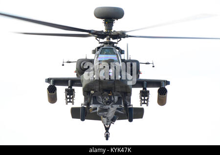 British Army Westland AH-64D Apache gunship, flying. Head on view Stock Photo