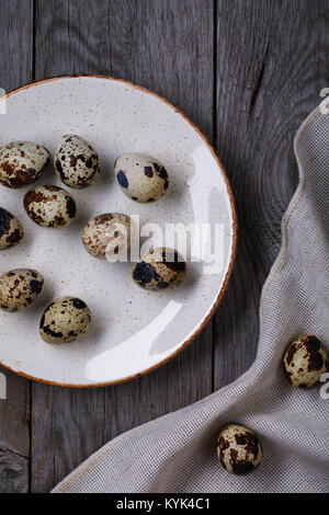 Boiled quail eggs on a plate, top view Stock Photo