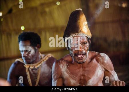 MAY 23, 2016: Portrait of a man from the tribe of Asmat people in the ritual face painting.  New Guinea Stock Photo