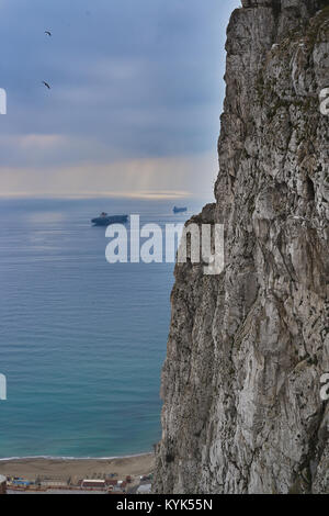 Freighter boats anchored in front of Gibraltar Rock, Gibraltar, United Kingdom Stock Photo