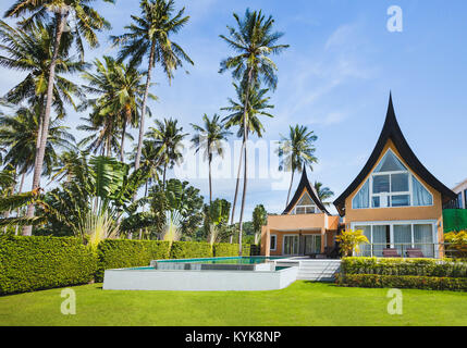 luxurious villa exterior, beautiful luxury vip house asian style with tropical swimming pool Stock Photo