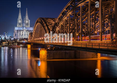 Cologne Cathedral and Hohenzollern Bridge in Cologne, Germany Stock Photo