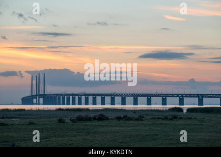 Oresund and Oresund Bridge at dusk viewed from Bunkeflostrand in Malmo, Sweden Stock Photo