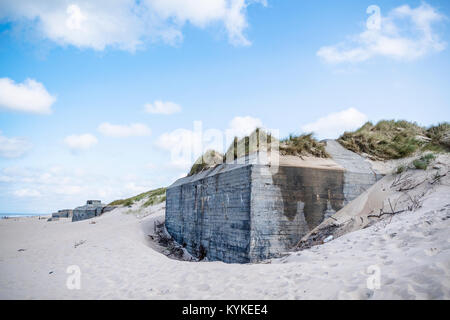 Close-up of a german bunker from the 2nd world war on a beach in Denmark in the summertime Stock Photo