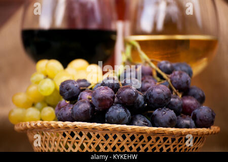 red and white grape over the red and white wine Stock Photo