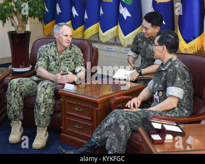 BUSAN, Republic of Korea (Sept. 14, 2017) Vice Adm. Phil Sawyer, commander of U.S. 7th Fleet, speaks with Vice Adm. Jung, Jin-Sup, commander of the Republic of Korea (ROK) Fleet, during an office call at ROK Fleet headquarters. Sawyer's visit includes meetings with U.S. and ROK military leaders as well as the signing of a component-level MOU with the ROK navy to enhance coordination and training in support of the U.S. and ROK alliance. (U.S. Navy photo by Mass Communication Specialist Seaman William Carlisle/Released) 170914-N-TB148-039 Stock Photo