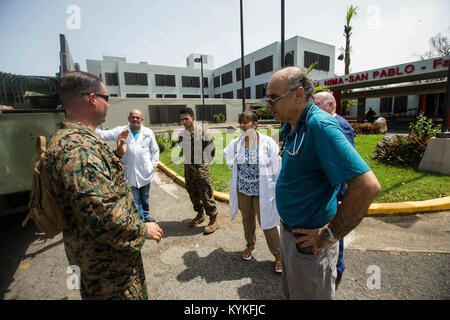 CEIBA, Puerto Rico (Sept. 26, 2017) U.S. Navy Lt. Robert R. Bryson, left, a physician assistant with the 26th Marine Expeditionary Unit (26th MEU), discusses medical and operational needs of Hima San Pablo Hospital with its staff as part of relief efforts for victims of Hurricane Maria in Ceiba, Puerto Rico, Sept. 26, 2017. The 26th MEU is supporting the Federal Emergency Management Agency, the lead federal agency, and local authorities in Puerto Rico and the U.S. Virgin Islands with the combined goal of protecting the lives and safety of those in affected areas. (U.S. Marine Corps photo by La Stock Photo