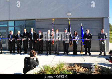 Kentucky Governor Steve Beshear and Adjutant General, Maj. Gen. Edward W. Tonini assisted with the ribbon cutting for the new Commonwealth Emergency operations Center in Frankfort, Ky., Oct. 21, 2013. (U.S. Army National Guard photo by Staff Sgt. Scott Raymond) Stock Photo