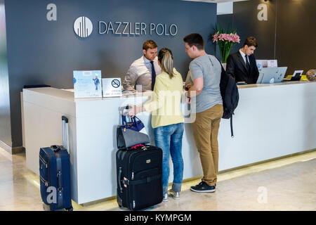 Buenos Aires Argentina,Palermo,Dazzler Polo,hotel,lobby,front-desk,clerk,man men male,woman female women,couple,guest,luggage,Hispanic,ARG171119229 Stock Photo