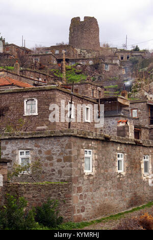 Old tower and turkish village in Behramkale, Turkey Stock Photo