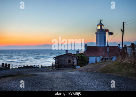 Sunset view of old white Inceburun lighthouse on the north coast of Sinop,Turkey. Stock Photo