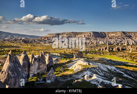 Beautiful landscape of ancient geological formation called fairy chimneys at sunset in Cappadocia valley, Turkey Stock Photo