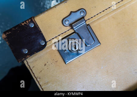 close-up on a closure in an old suitcase Stock Photo