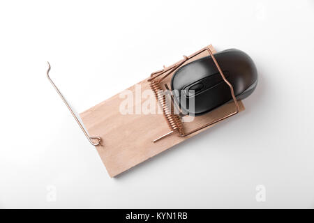 computer mouse in mousetrap - censored internet and web crime concept. top view Stock Photo