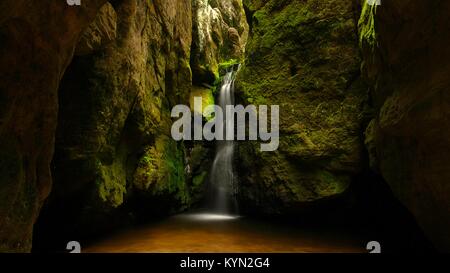 A small waterfall between rocks Stock Photo