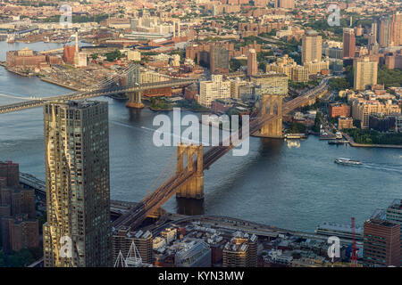 The Brooklyn Bridge is a hybrid cable-stayed/suspension bridge in New York City and is one of the oldest roadway bridges in the Usa Stock Photo