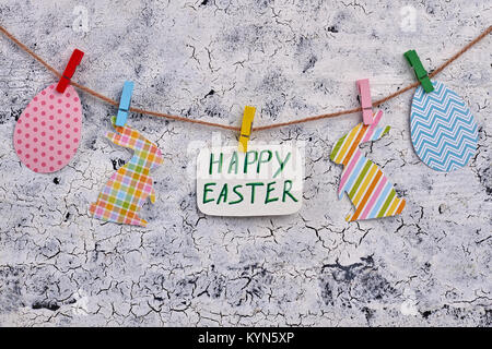 Easter greeting card and paper decorations. Stock Photo