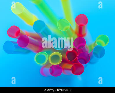 multi-colored plastic tubes for a cocktail, top view, close up Stock Photo