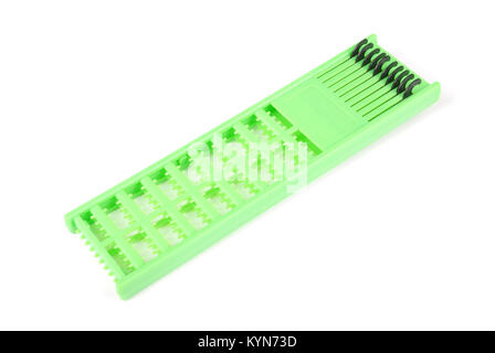 One green hair extender stops isolated on white background Stock Photo