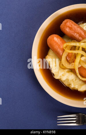 Scandinavian or Norwegian Sausage and Mashed Potatoes With Gravy and Fried Onions Stock Photo