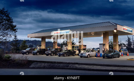 Costco Gasoline, Costco, North American membership warehouse chain store gas station in the evening. Costco Gas Bar. Victoria, Vancouver Island, BC Stock Photo