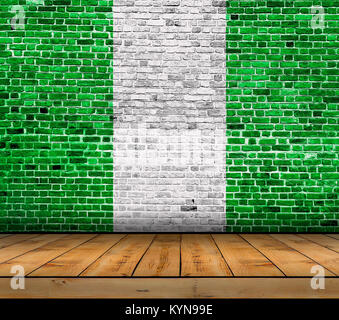 Nigeria flag painted on brick wall with wooden floor Stock Photo