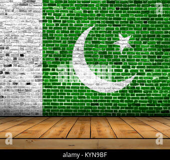 Pakistan flag painted on brick wall with wooden floor Stock Photo