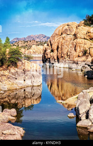 A cove at Watson Lake with Granite Mountain in the background.  Prescott, Arizona Stock Photo