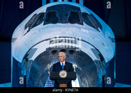 Vice President Mike Pence delivers opening remarks during the National Space Council's first meeting, Thursday, Oct. 5, 2017 at the Smithsonian National Air and Space Museum's Steven F. Udvar-Hazy Center in Chantilly, Va. The National Space Council, chaired by Vice President Mike Pence heard testimony from representatives from civil space, commercial space, and national security space industry representatives.  Photo Credit: (NASA/Joel Kowsky) Stock Photo