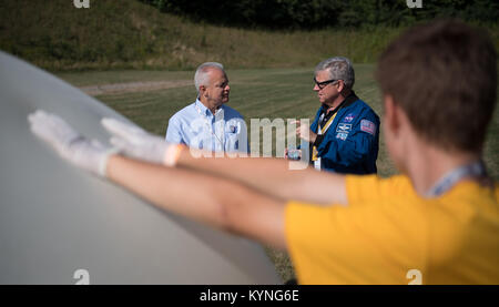 NASA Acting Chief Technologist Douglas Terrier, left, and Greg “Box” Johnson, executive director of Center for the Advancement of Science in Space (CASIS) and former astronaut, right, watch as attendees of the Boy Scouts of America National Jamboree prepare to launch a weather balloon, Tuesday, July 25, 2017 at the Summit Bechtel Reserve in Glen Jean, West Virginia. Photo Credit: (NASA/Bill Ingalls) Stock Photo