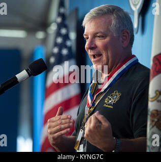 Greg “Box” Johnson, executive director of Center for the Advancement of Science in Space (CASIS) and former astronaut gives remarks after having received an honorary Eagle Scout Award during the Boy Scouts of America National Jamboree, Tuesday, July 25, 2017 at the Summit Bechtel Reserve in Glen Jean, West Virginia. Photo Credit: (NASA/Bill Ingalls) Stock Photo