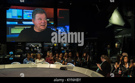 William Shatner of Star Trek, is seen on a live feed from NASA's Jet Propulsion Laboratory, giving the order to send a message into deep space, during an event to celebrate the 40th Anniversary of the launch of the Voyager 1 and 2 missions, Tuesday, September 5, 2017 at Smithsonian's National Air and Space Museum in Washington. Voyager 1 was launched September 5, 1977, with a mission to study Jupiter and Saturn, but now the twin Voyager spacecrafts are on a journey into interstellar space to search for the heliopause, a region never reached by any other spacecraft. Photo Credit: (NASA/Aubrey G Stock Photo