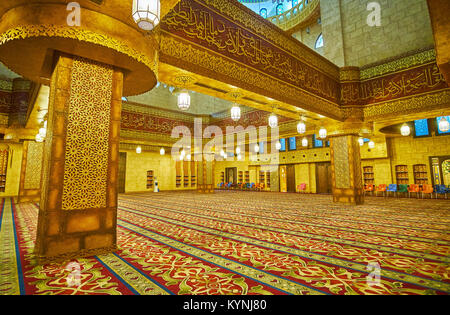 SHARM EL SHEIKH, EGYPT- DECEMBER 15, 2017: Interior of modern Al Sahaba mosque is decorated with numerous Arabic inscriptions from Quran, on December 