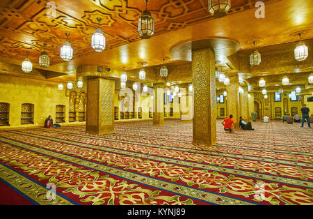 SHARM EL SHEIKH, EGYPT- DECEMBER 15, 2017: The lower prayer hall of Al Sahaba mosque is decorated with gilt islamic patterns, carved wooden ceiling an Stock Photo